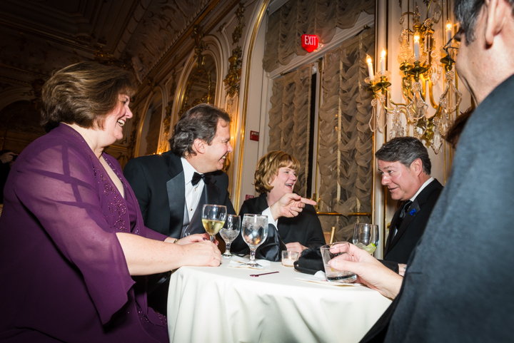  Adair and John Leach, Pattie Haynes, Feodor Byndas, and Fairfax County Deputy Executive David Molchany (from left) laugh while taking advantage of the bar during cocktail hour. 