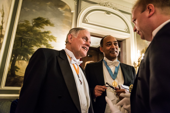  Edward Wilson and Prince Ermias Sahle-Selassie of Ethiopia laugh with chairman Paul du Quenoy. 